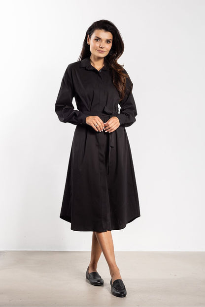 Stylish belted midi shirt dress by Awama, highlighting its flattering silhouette and luxurious fabric blend.