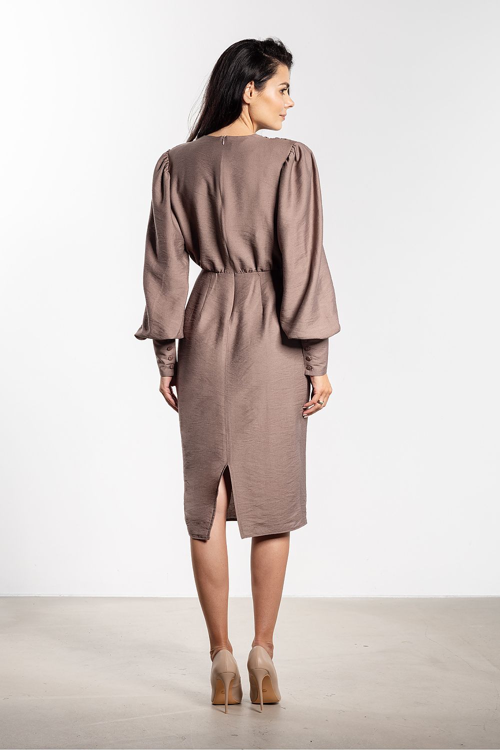 Elegant fitted midi cocktail dress by Awama featuring a deep V neckline and sophisticated puff sleeves.