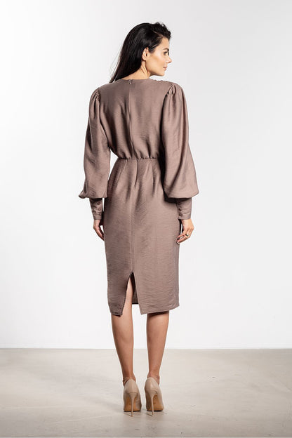 Elegant fitted midi cocktail dress by Awama featuring a deep V neckline and sophisticated puff sleeves.