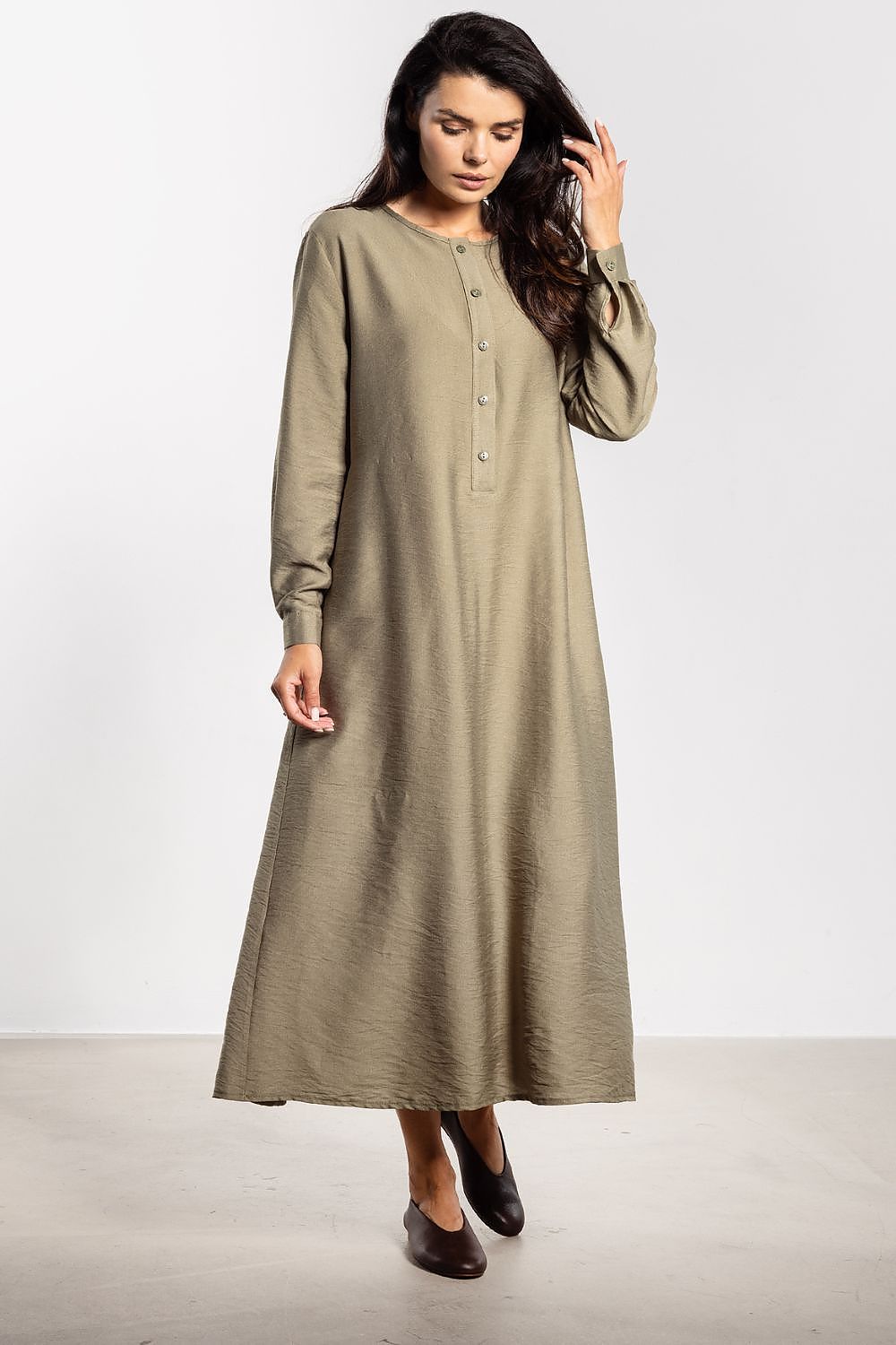 Elegant awama A-Line maxi dress featuring a stylish belt, perfect for sophisticated casual occasions.