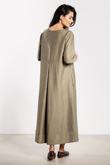 Luxurious awama ankle-length A-Line maxi dress, adorned with delicate buttons and comfortable long sleeves.