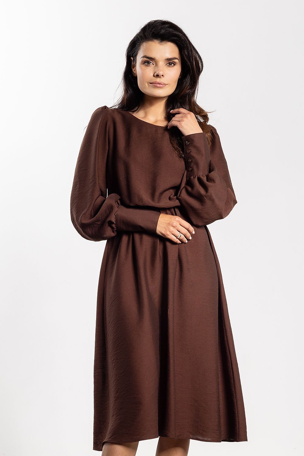 Detailed view of the elegant midi dress by Awama, highlighting the knee-length design suitable for both casual and formal events.