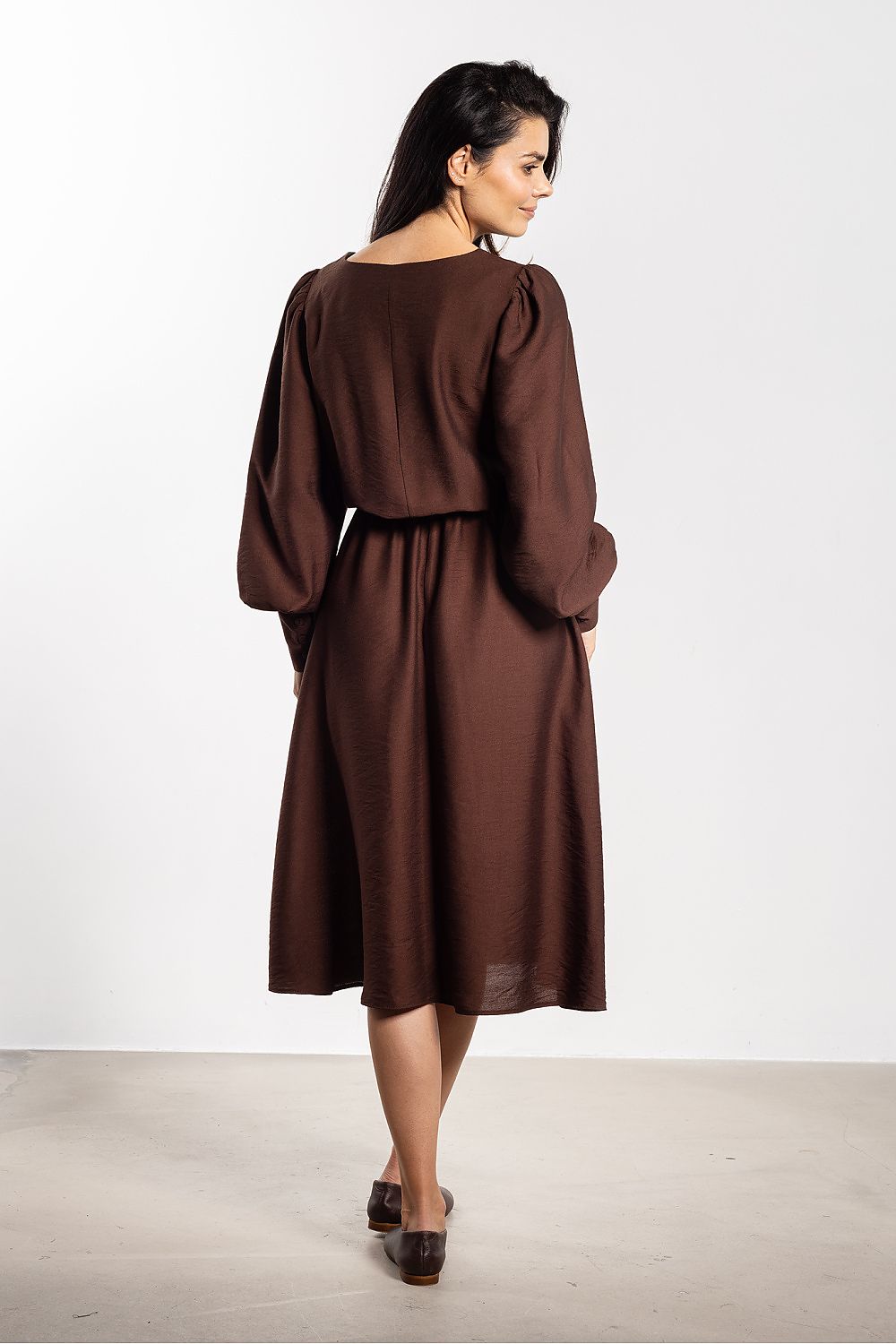 The luxurious blend of nylon and rayon in the Awama midi dress, crafted to provide a timeless and stylish look.