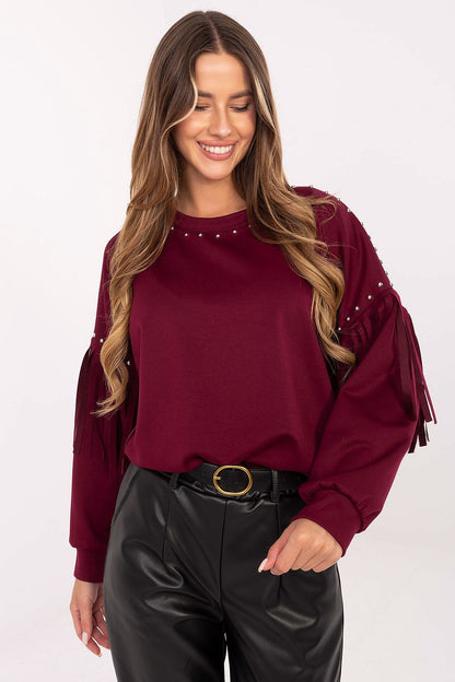 Stylish Rue Paris Women's Casual Sweatshirt with decorative studs and fringes, designed for comfort and sophistication, ideal for casual outings.