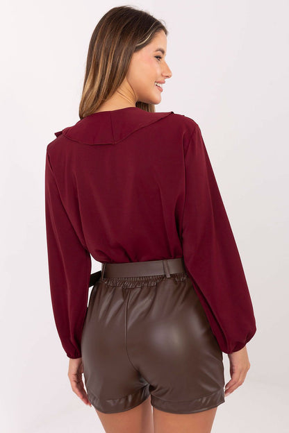 Stylish women's high-waist leather shorts with a smooth texture and elastic back by Rue Paris, combining comfort and elegance.