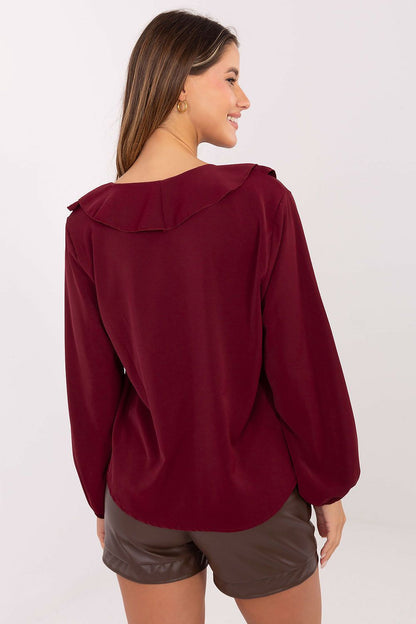 Sophisticated women's blouse in classic workwear style by Rue Paris, featuring puffy sleeves and a smooth pattern.