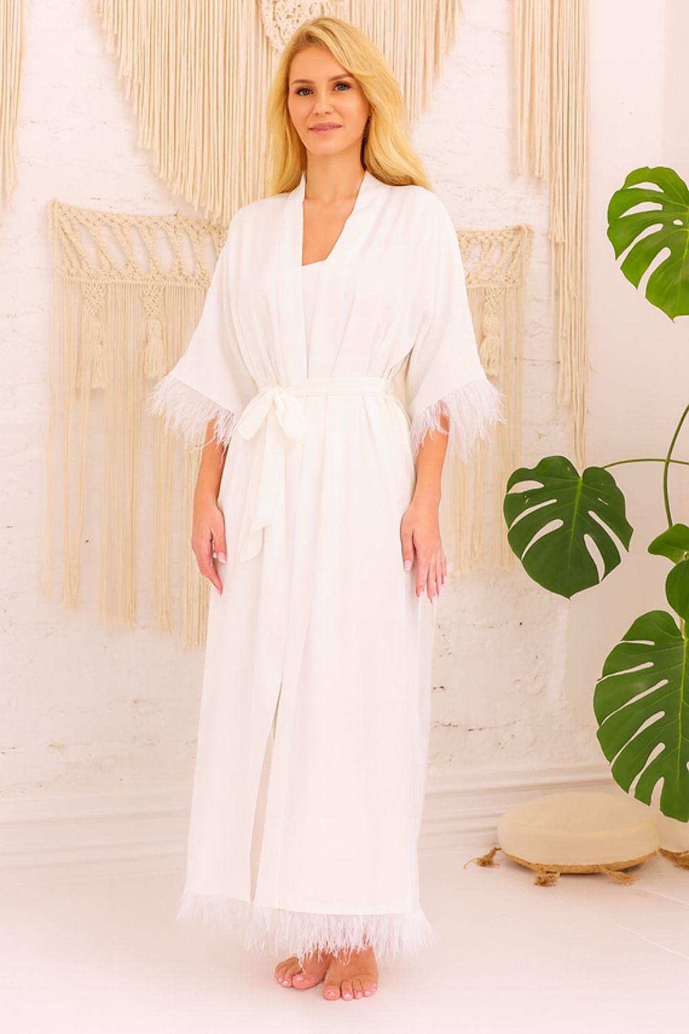 Styled shot of the Kalimo Diva Luxury Bathrobe displayed elegantly, highlighting its flowing silhouette and luxurious satin material.