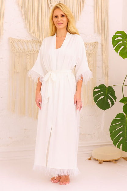 Styled shot of the Kalimo Diva Luxury Bathrobe displayed elegantly, highlighting its flowing silhouette and luxurious satin material.