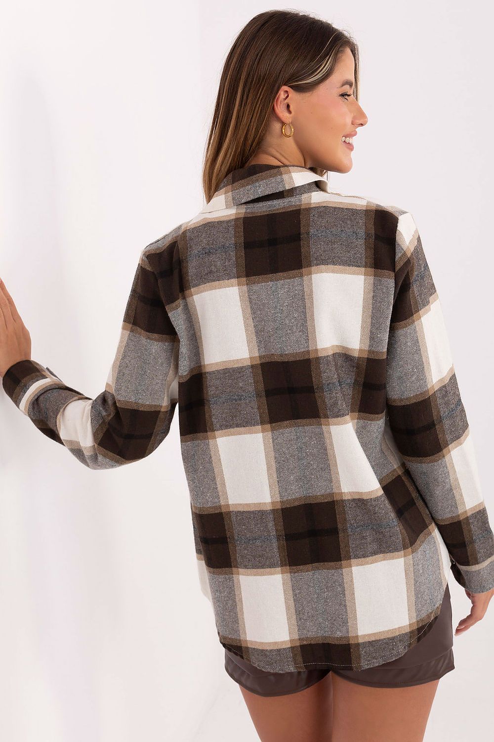 Stylish presentation of the Rue Paris plaid shirt worn casually, highlighting its everyday charm and timeless appeal for women.