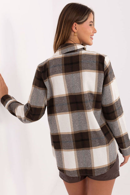Stylish presentation of the Rue Paris plaid shirt worn casually, highlighting its everyday charm and timeless appeal for women.