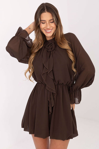 Chic back view of Rue Paris mini cocktail dress showcasing intricate ruffles and a flattering silhouette, ideal for parties and receptions.