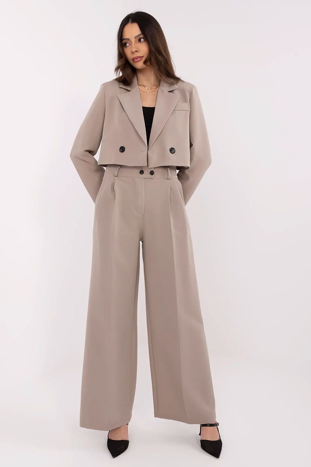 Versatile Rue Paris women's set displayed, featuring a short blazer and long trousers, designed for both comfort and elegance, ideal for day-to-night transitions.