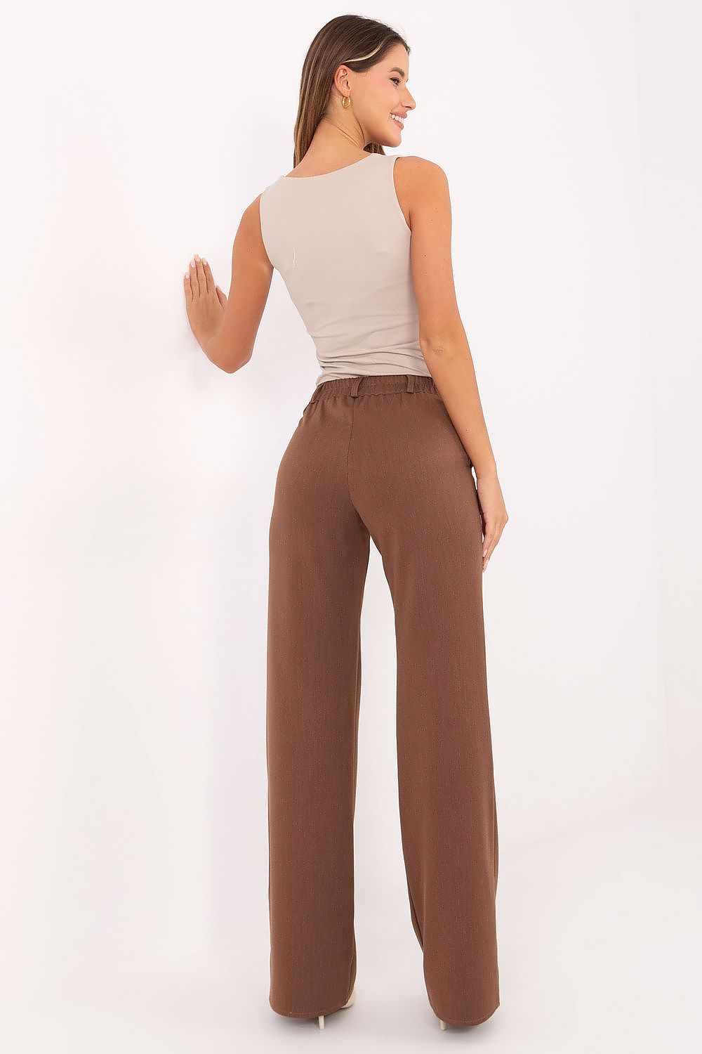 Fashion-forward Lakerta Women's High-Waisted Trousers, designed with side pockets and a sleek zipper closure, offering both practicality and luxury.