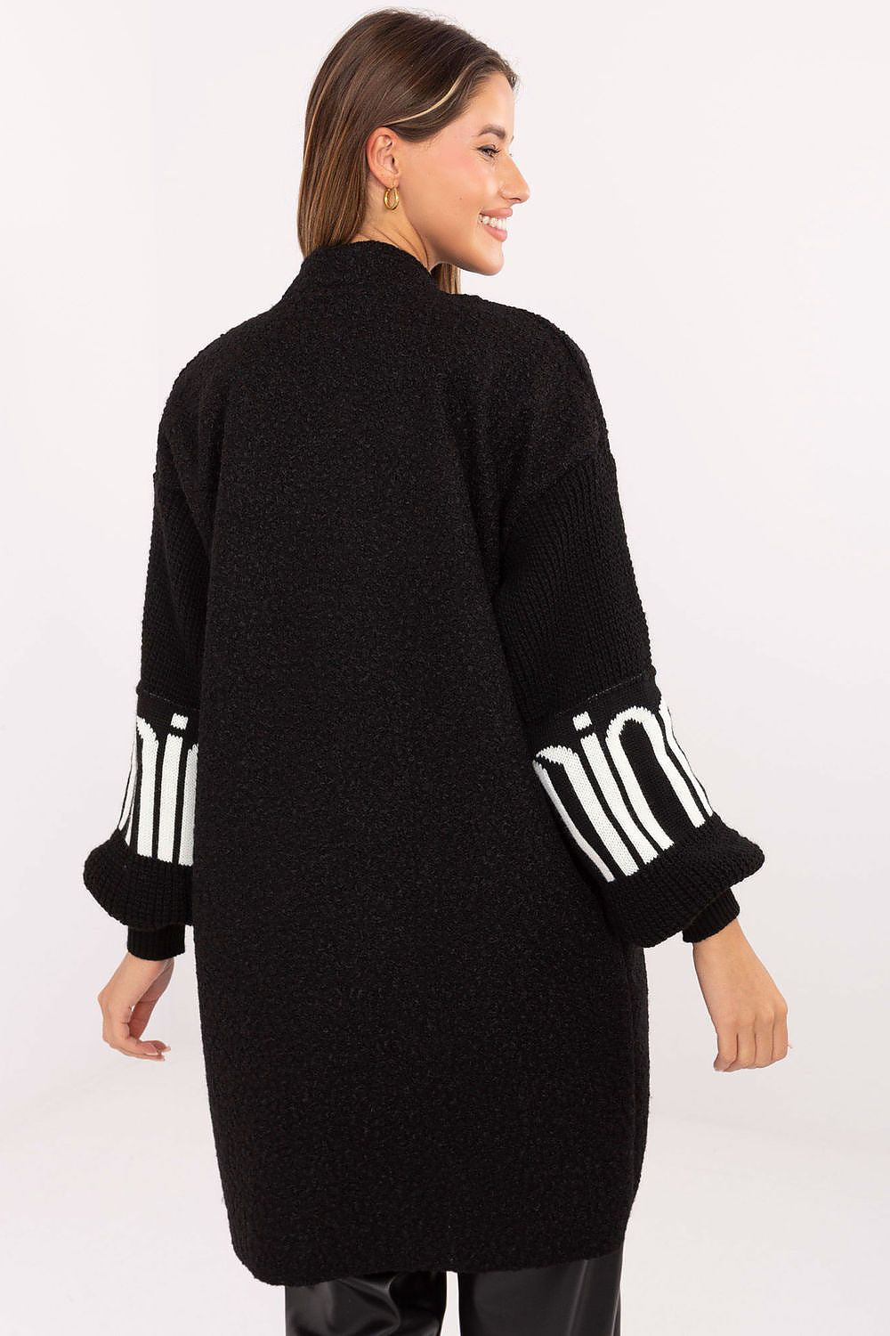 Close-up of the soft polyester texture and unique details of the Women's Boucle Cardigan, designed by Factory Price to elevate casual outfits.