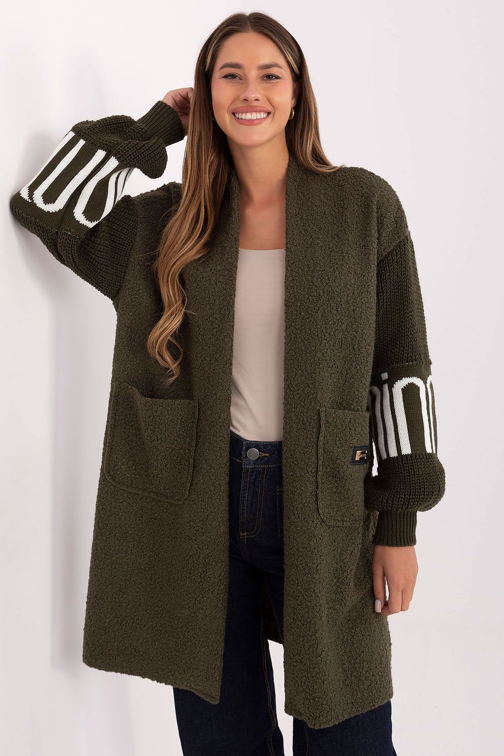 Elegant women's boucle cardigan by Factory Price, featuring long sleeves and knee-length design, perfect for stylish layering in any wardrobe.