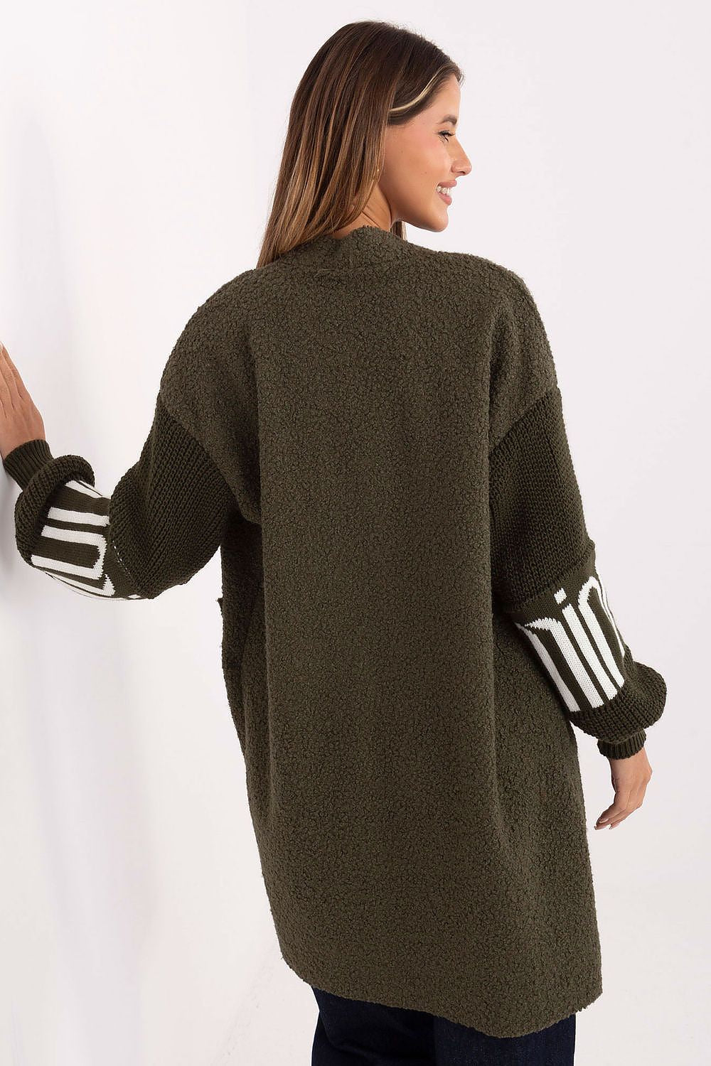 Fashionable women's boucle cardigan by Factory Price, ideal for casual or elegant outfits, crafted from soft polyester with slip pockets for added convenience.