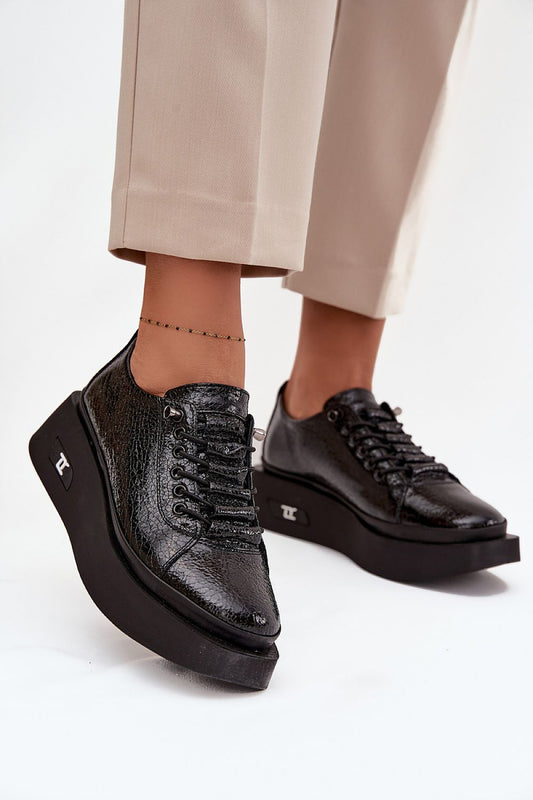 Luxury patent leather slip-on shoes for women by Step in Style featuring elegant elastic bands and a modern platform.