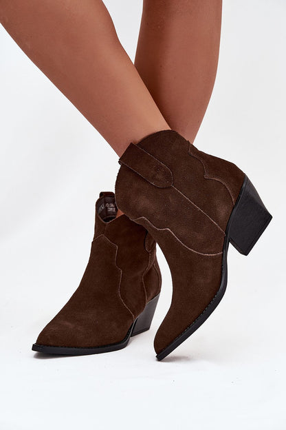 Stylish display of Step in Style's Luxury Women's Suede Ankle Boots, highlighting the chic cut heel and versatile wear for both casual and dressy outfits.