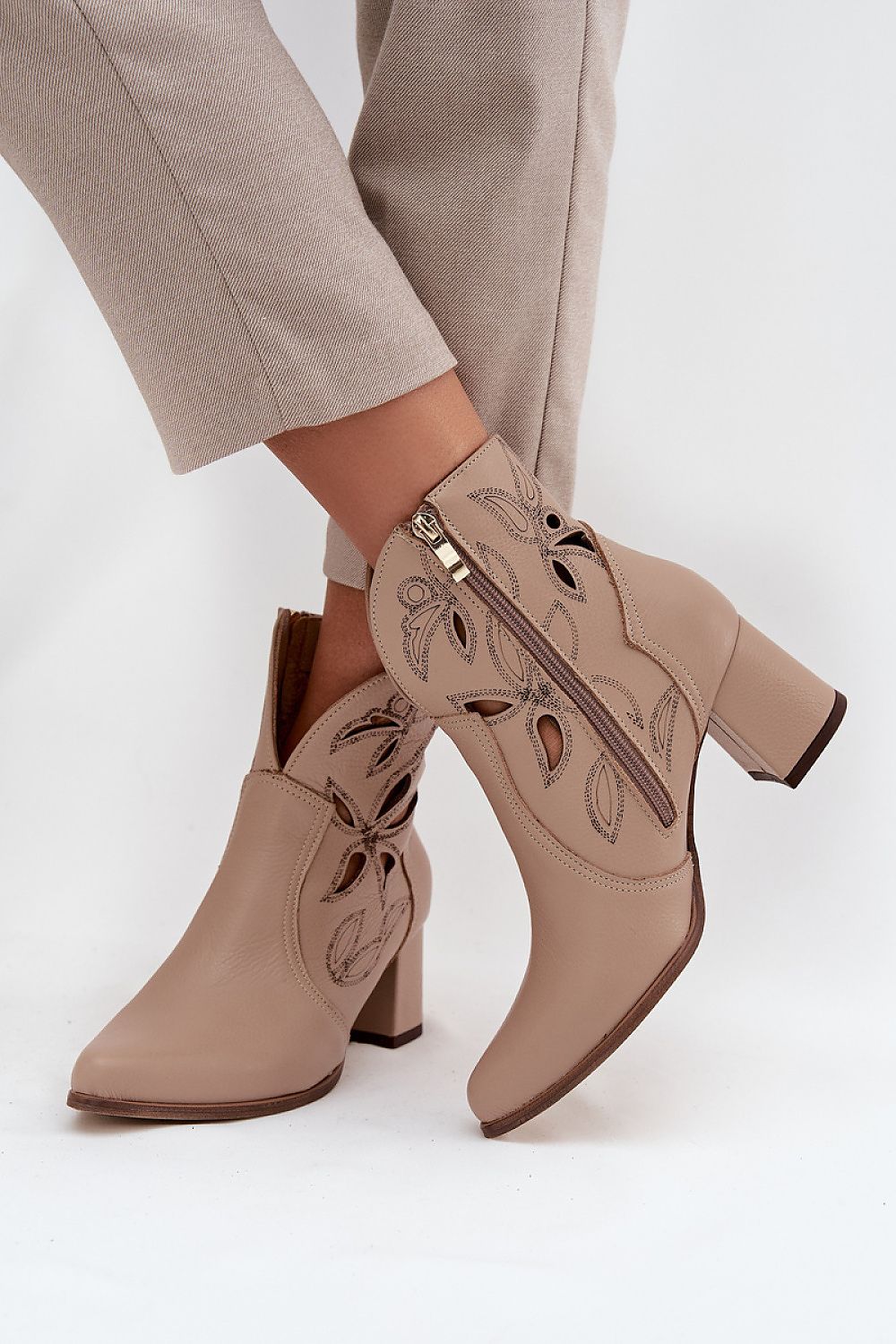 Luxury women's ankle boots in rich natural leather with pointed toes and column heels by Step in Style.