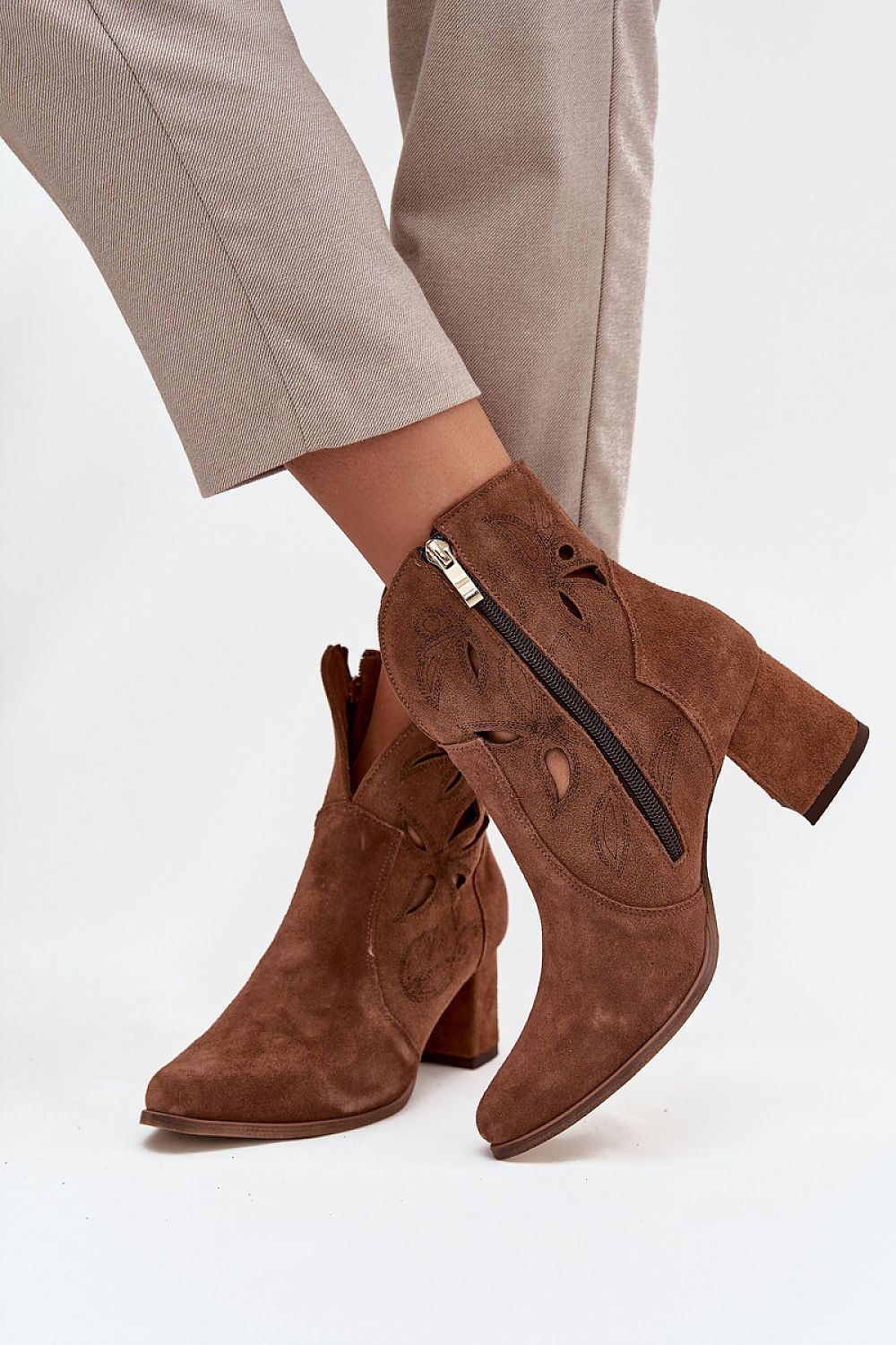 Chic pointed toe ankle boots for women by Step in Style, crafted from natural leather for a stylish yet comfortable everyday wear.