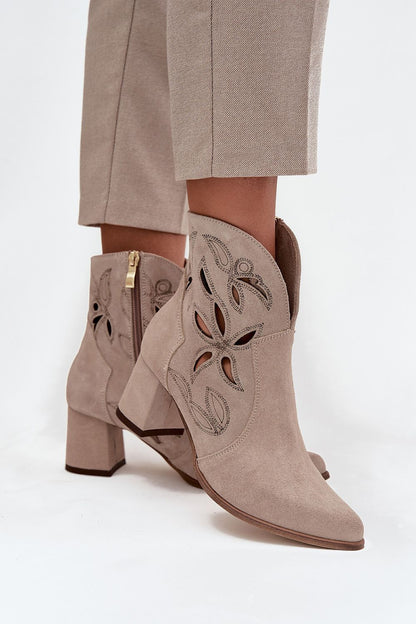 Elegant luxury women's ankle boots in natural leather by Step in Style, featuring pointed toes and column heels, perfect for sophisticated outfits.