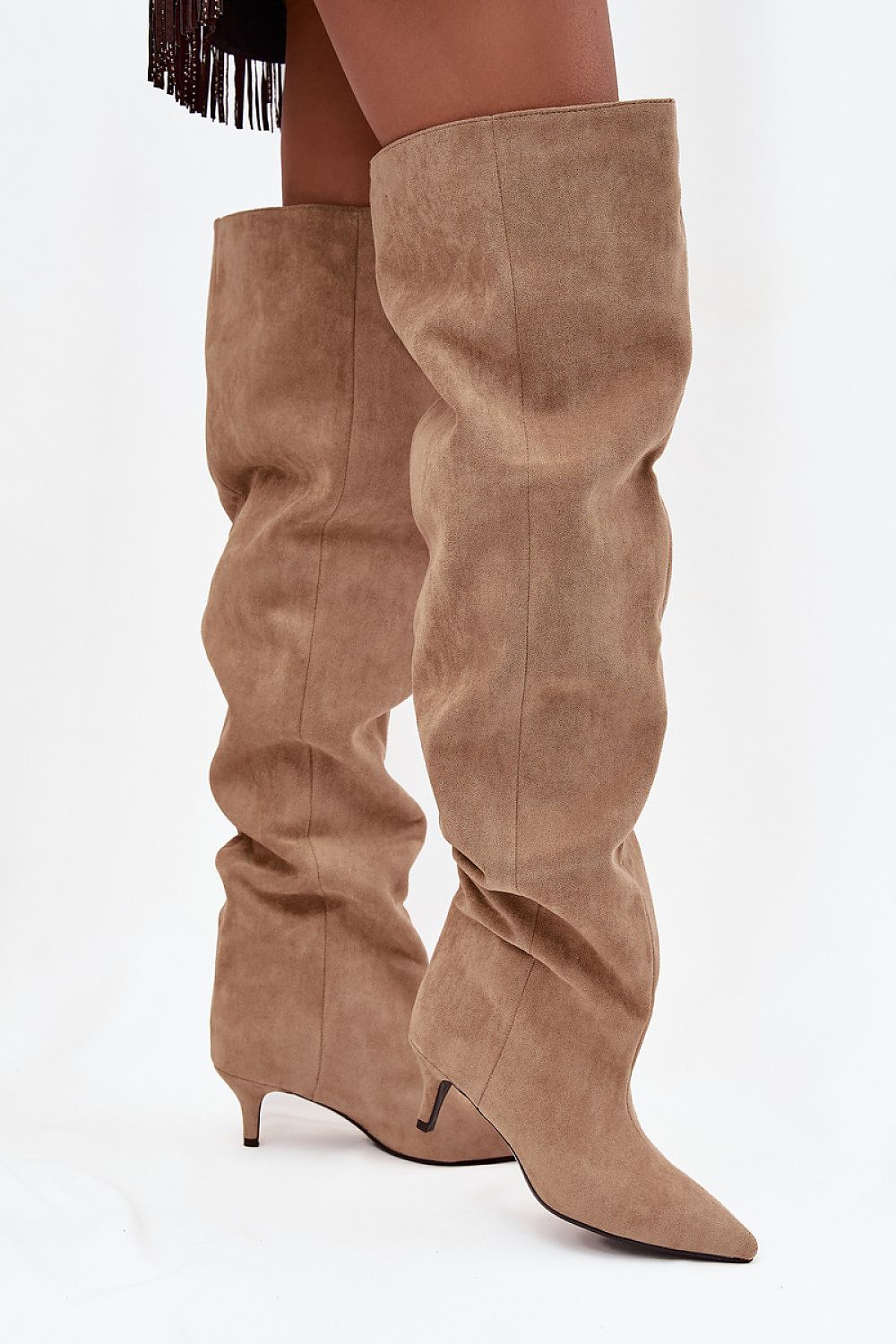 Elegant Eco-Suede Wide Shaft Knee-High Boots by Step in Style, designed with a low stiletto heel for refined everyday wear.