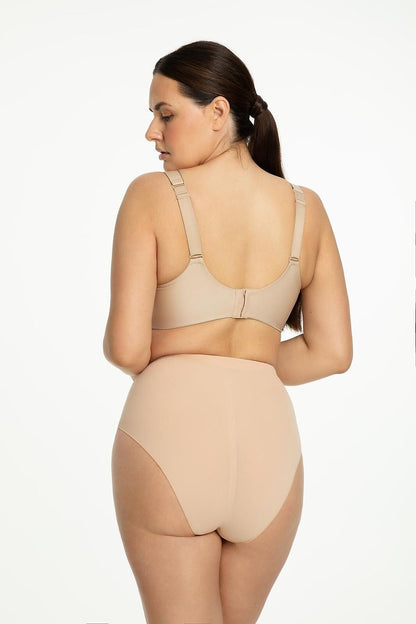 Model wearing Julimex Seamless High-Waisted Slimming Panties in various sizes, illustrating elegance and modern shaping capabilities for every woman.