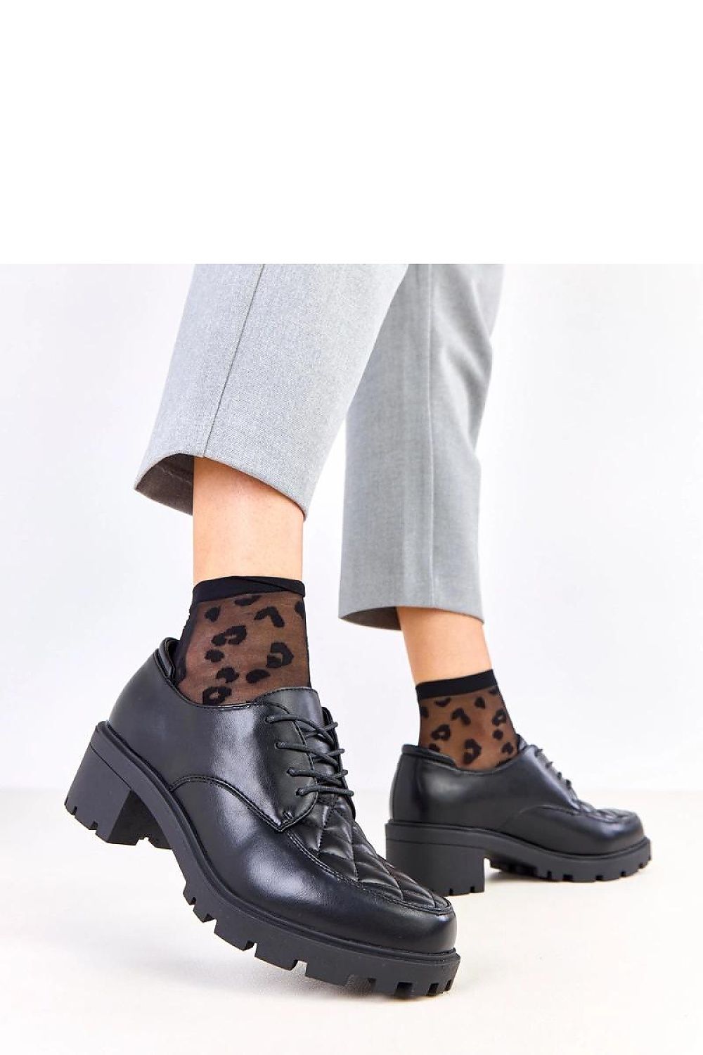 Solea Quilted Lace-Up Heeled Shoes in luxurious ecological leather featuring elegant quilted details, perfect for sophisticated occasions.