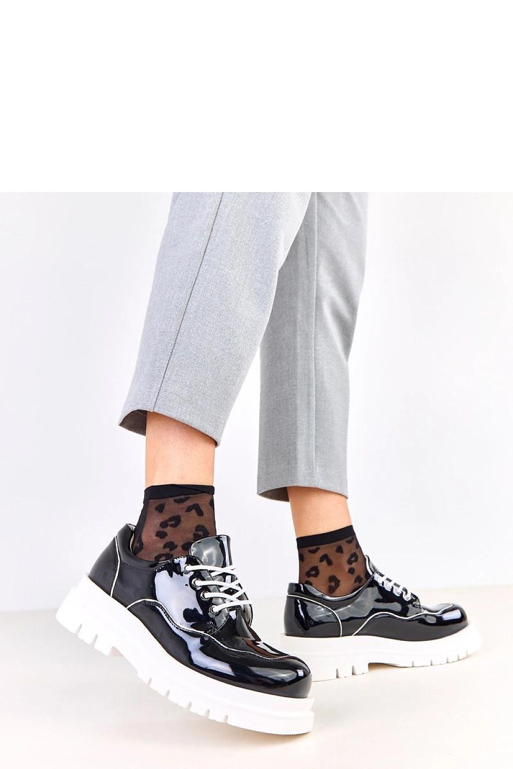 Close-up view of Solea Women's Polished Half Shoes highlighting the intricate lacing and the luxurious natural leather insole for all-day comfort.