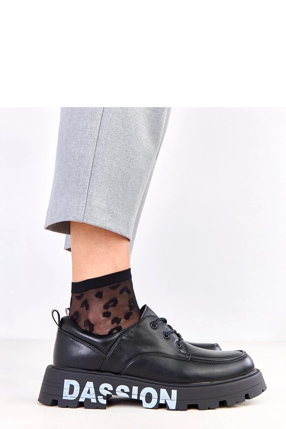 Close-up of Solea Women's Platform Half Shoes, highlighting the soft faux leather and chic decorative details, ideal for sophisticated urban outfits.