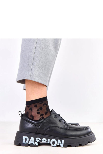 Close-up of Solea Women's Platform Half Shoes, highlighting the soft faux leather and chic decorative details, ideal for sophisticated urban outfits.