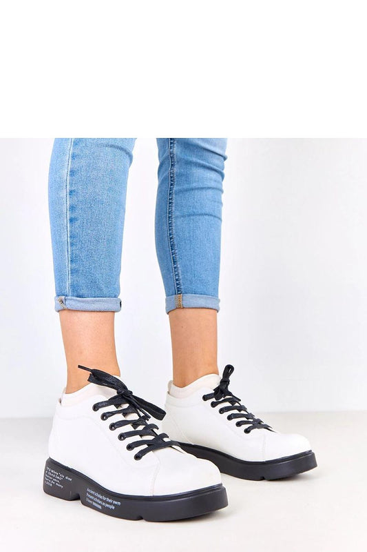 Stylish eco-leather platform half shoes for women by Solea, featuring decorative inscriptions and a sleek design for modern elegance.