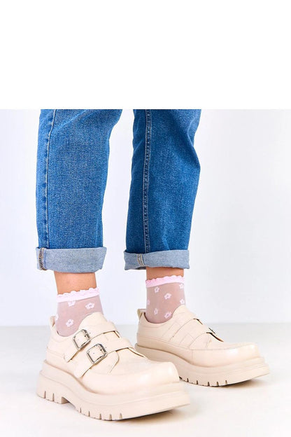 Luxury Solea Slip-On Platform Shoes in eco-leather with decorative buckles, showcasing modern elegance and comfort. Designed for sizes EU 36-41, featuring a stable 5 cm platform and round toe for a sophisticated silhouette.