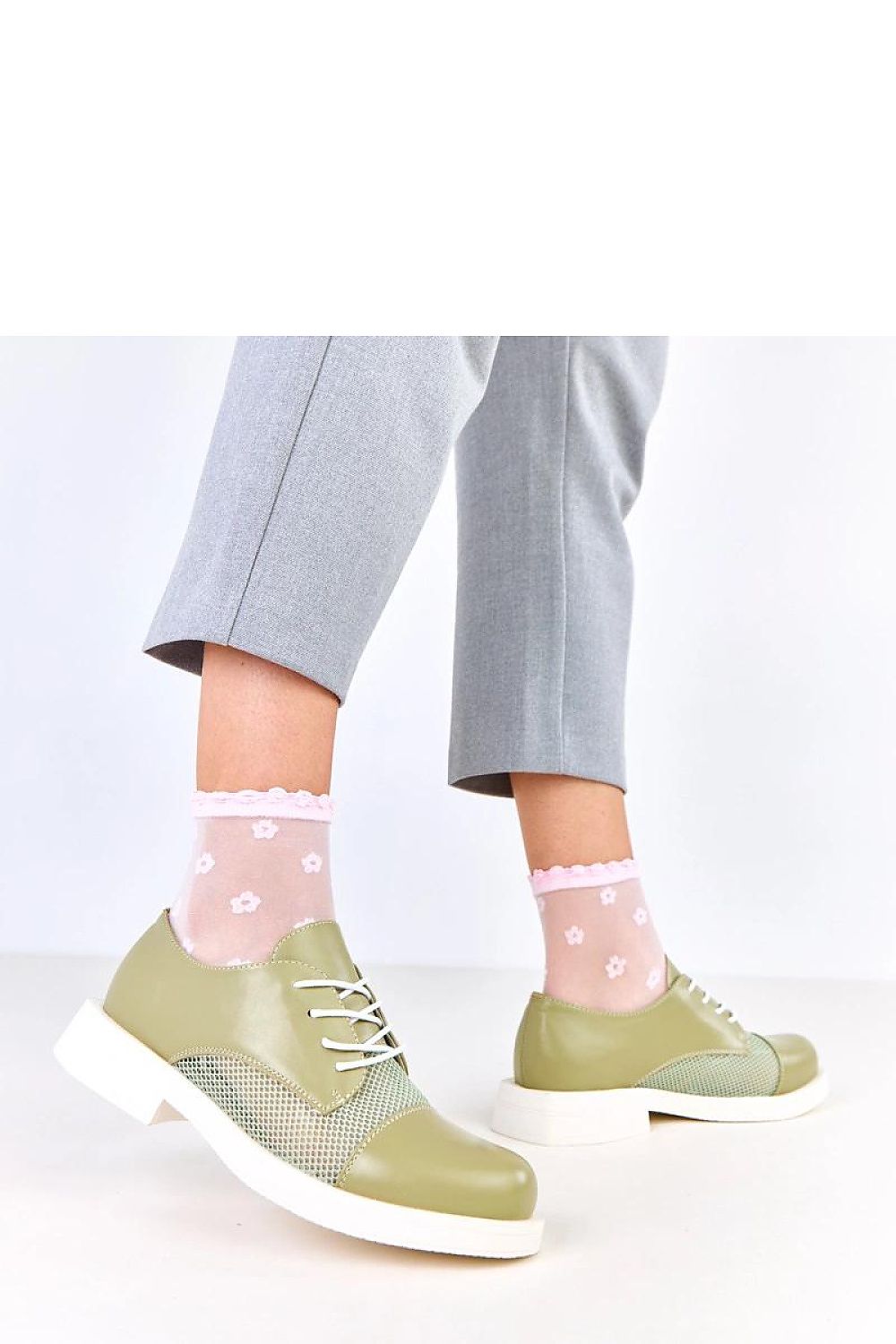 Solea Lace-Up Half Shoes with decorative mesh insert, made from high-quality synthetic leather, showcasing a modern classic design.