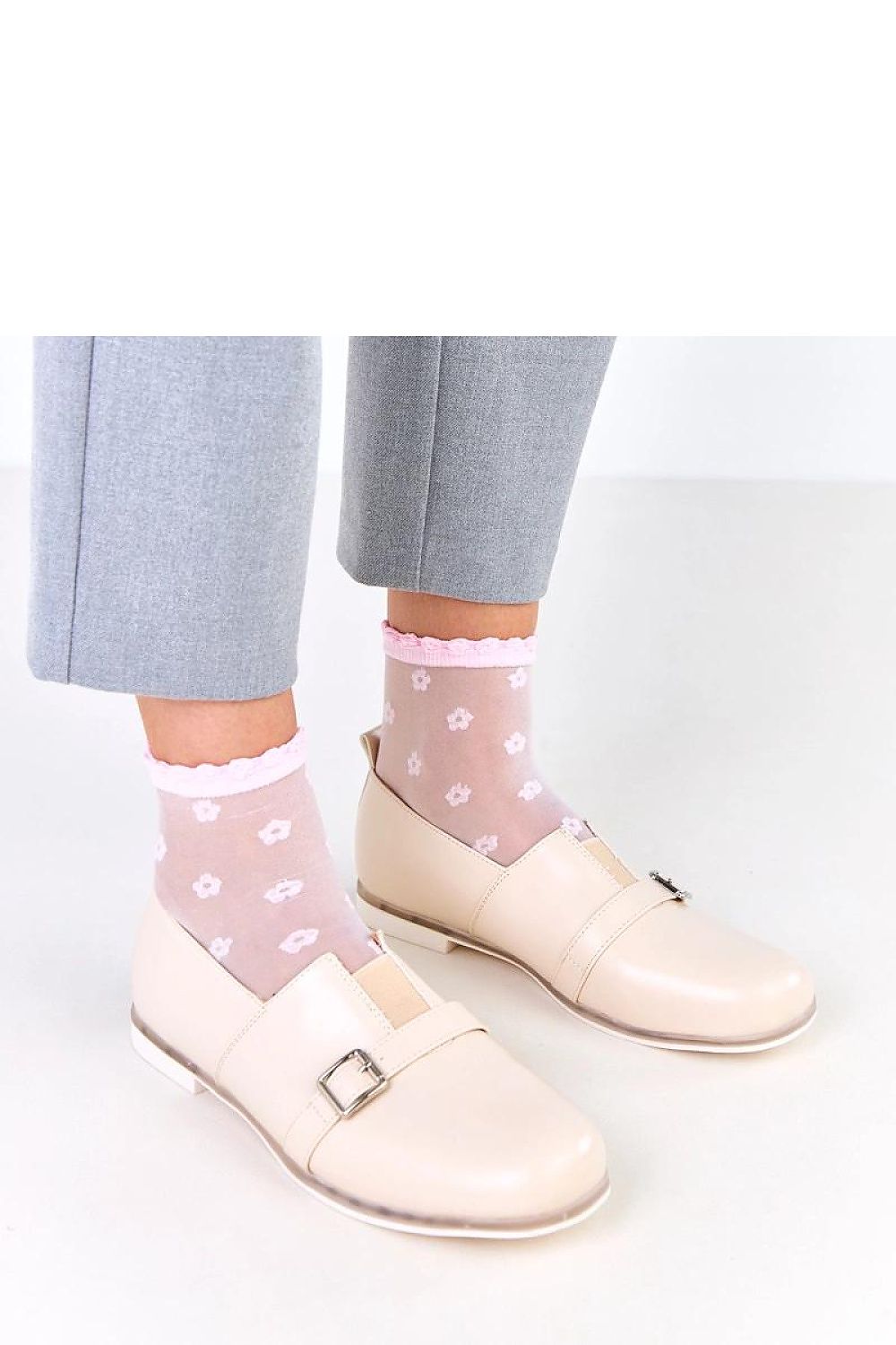 Elegant slip-on half shoes by Solea in eco-leather with a decorative buckle, showcasing a timeless design suitable for both casual and formal occasions, available in sizes EU 36-41.