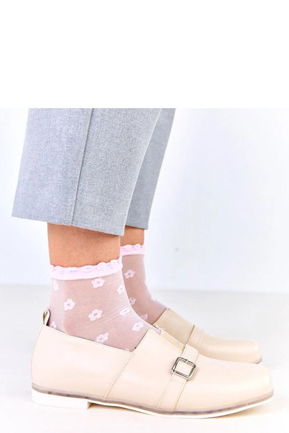 Elegant slip-on half shoes by Solea made of eco-leather with a decorative buckle, showcasing a luxurious and modern design.