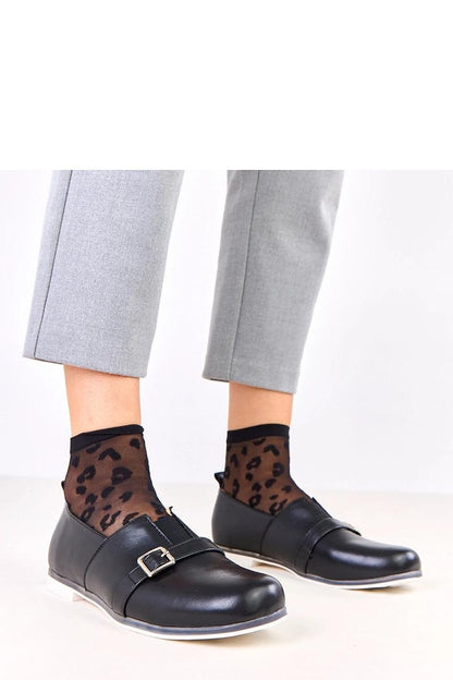 Elegant eco-leather slip-on half shoes by Solea featuring a decorative buckle, round toe design for superior comfort and timeless style.