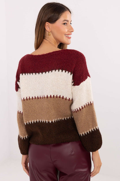 Chic oversized jumper by Italy Moda showcasing a stylish striped pattern, perfect for winter layering.