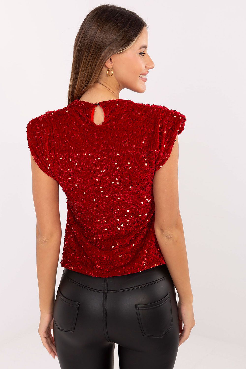 Luxurious sequined sleeveless blouse showcasing a modern silhouette with shoulder pads, designed by Italy Moda for a distinguished look.