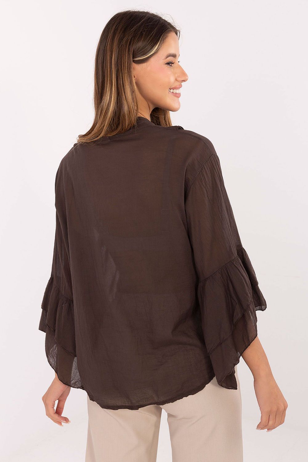 Close-up of Italy Moda's luxurious cotton shirt with delicate ruffles and a round neckline, ideal for stylish office outfits.