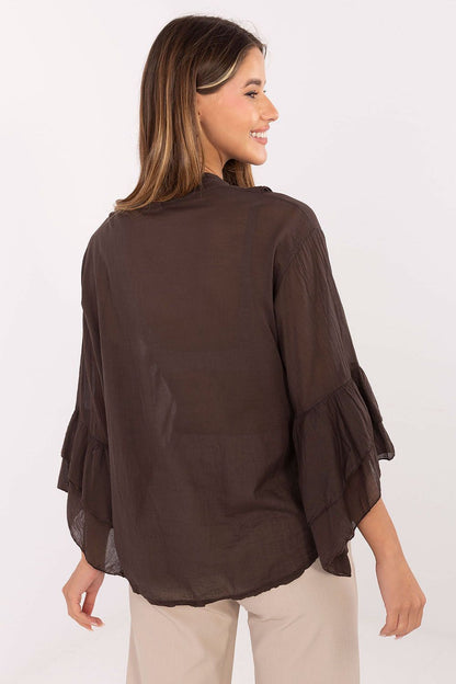 Close-up of Italy Moda's luxurious cotton shirt with delicate ruffles and a round neckline, ideal for stylish office outfits.