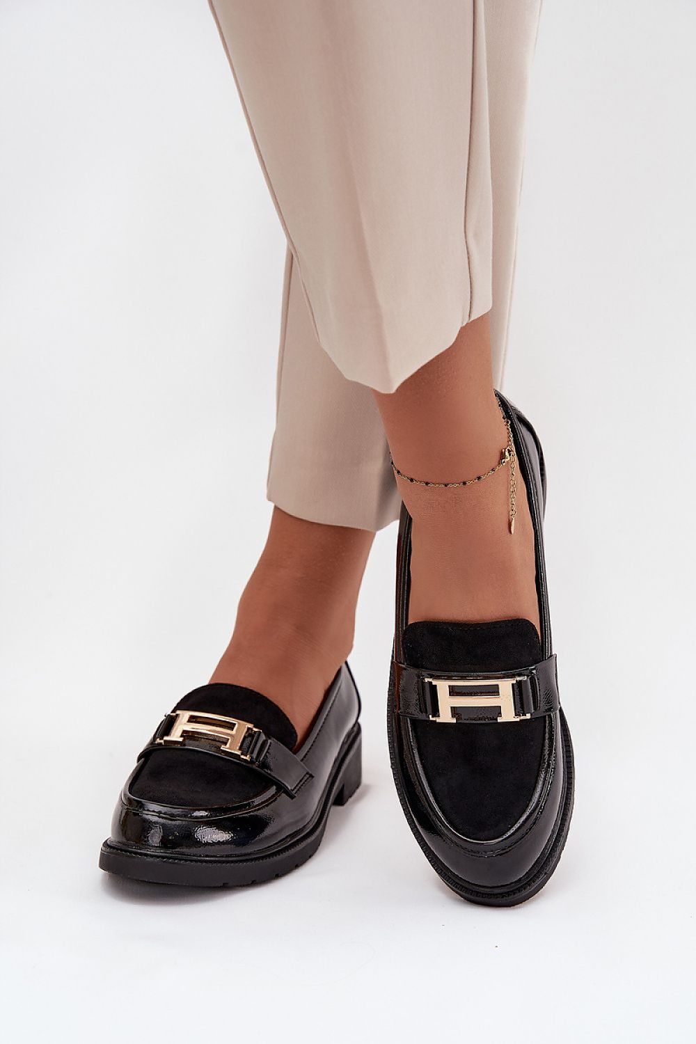 Elegant women’s loafers by S. Barski in eco leather, showcasing a classic design with a stylish strap and gold accent, available for sizes EU 36-41. Perfect for work or casual outings, offers comfort with a natural leather footbed.