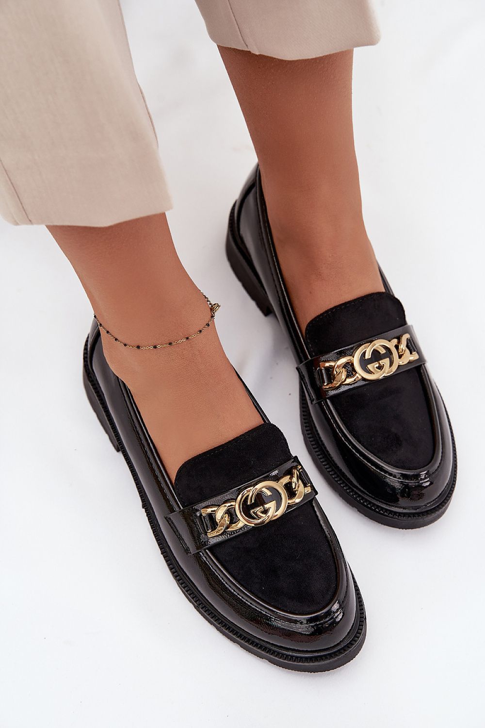 Stylish arrangement of Step in Style's eco-leather loafers, featuring ornate golden details and a comfortable fit for women's sizes EU 36-41.