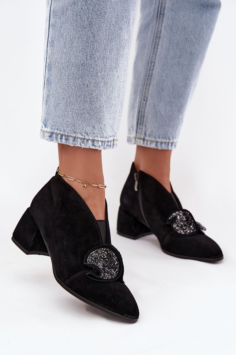 Elegant suede ankle boots by Step In Style featuring a stylish 6cm block heel and almond toe, perfect for sophisticated outfits.