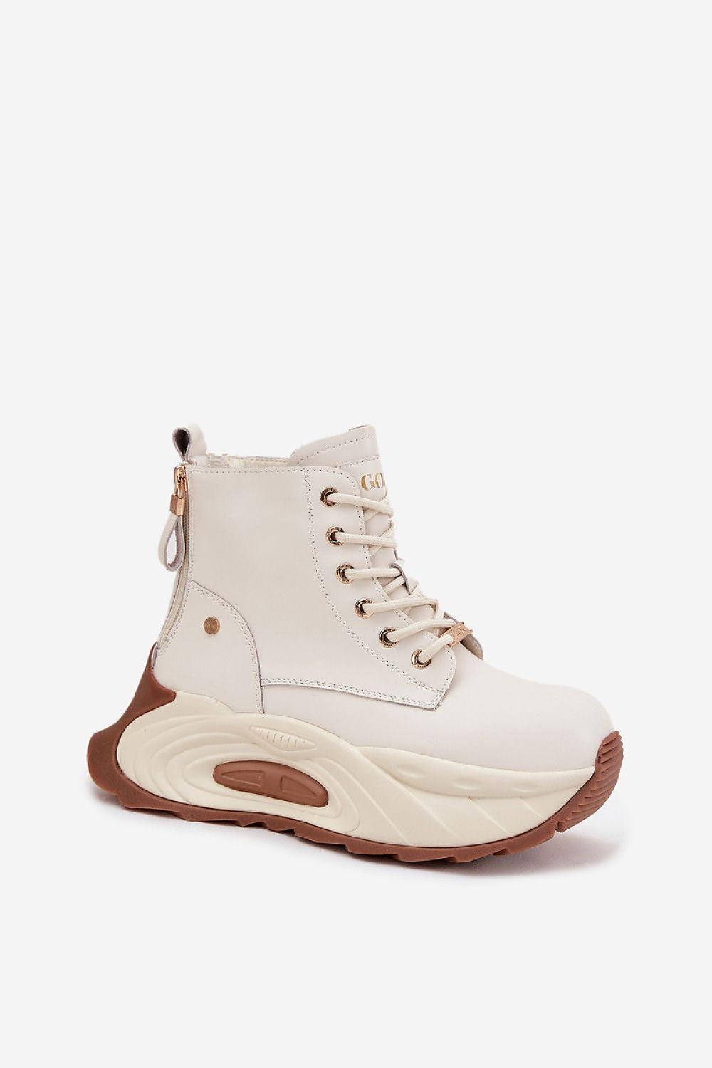 Side view of luxurious GOE women's platform ankle boots showcasing natural leather construction and stylish back zippers.