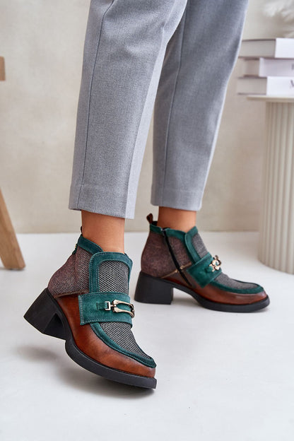 Elegant Maciejka ankle boots with chunky block heel, featuring a stylish zipper closure, designed by Step in Style.