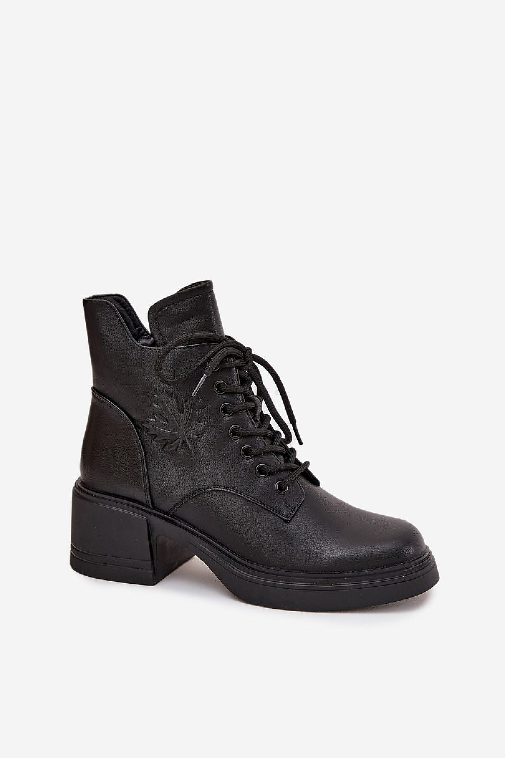 Close-up view of Vinceza Women's Leather Boots with exquisite leaf embossing, perfect for cooler days, designed by Step in Style.