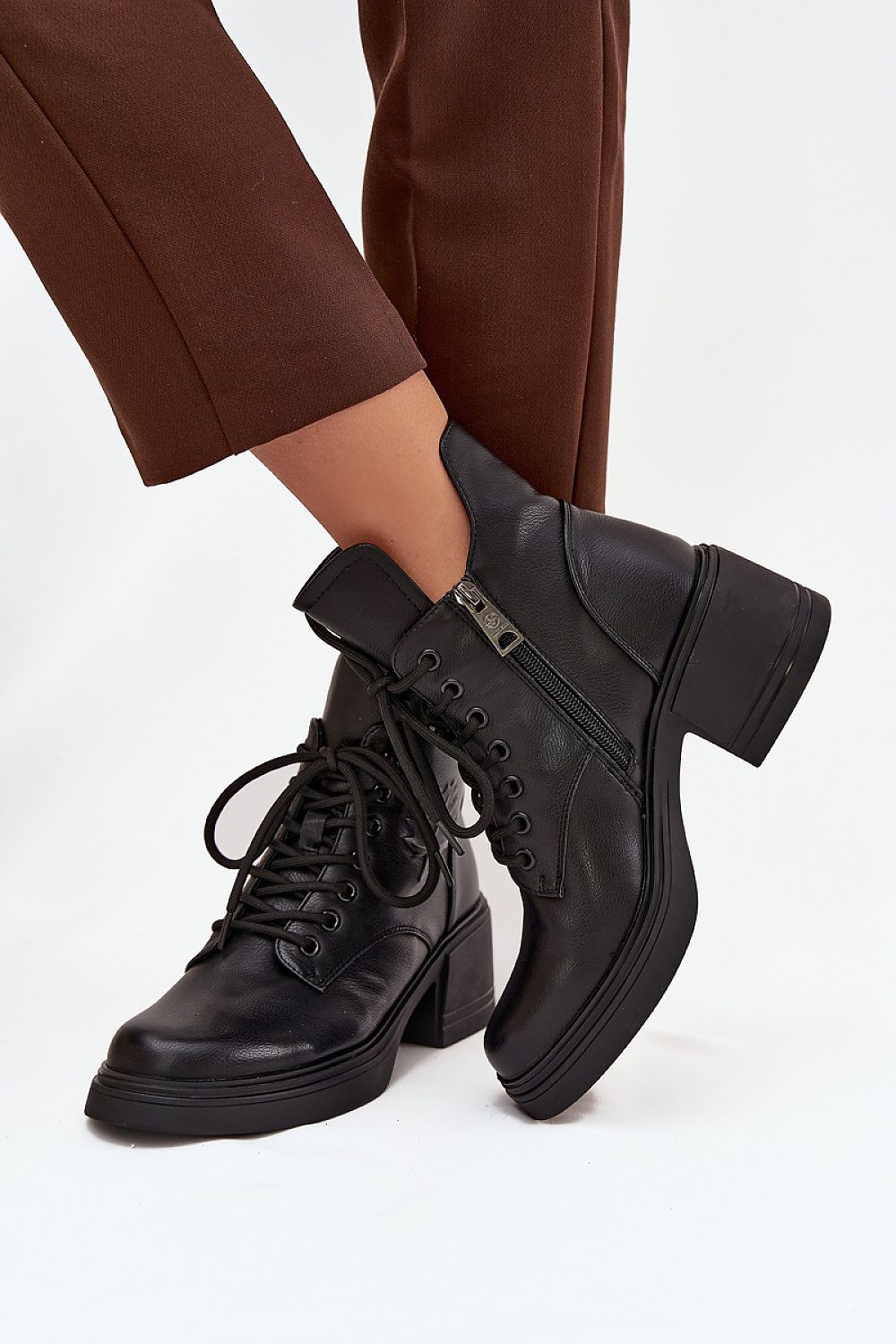 Elegant Vinceza women's leather boots featuring a block heel, lacing, and zipper for easy wear, perfect for stylish everyday outfits.