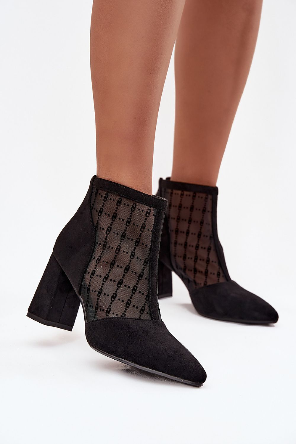 Elegant women's eco suede ankle boots by Step in Style, featuring breathable mesh and a chic column heel, designed for special occasions and enhancing feminine silhouettes.