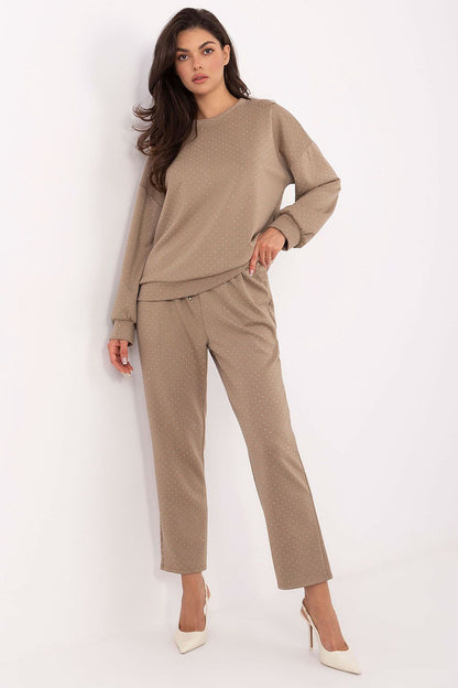 Elegant women's tracksuit set with jet stones by Rue Paris, featuring a stylish sweatshirt and high-waisted pants, ideal for both casual and formal occasions.